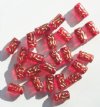 24 13mm Transparent Red & Gold Textured Tube Beads